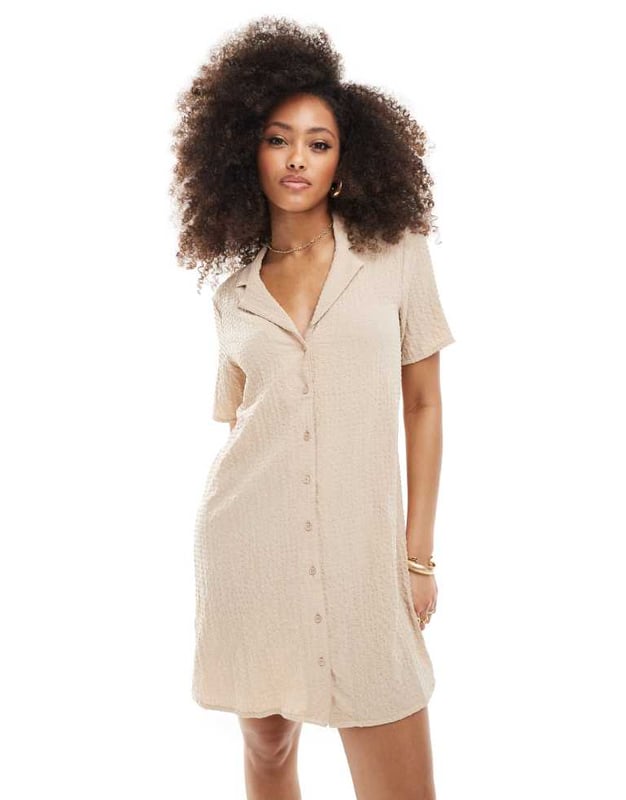 Dresses by JDY Do get caught wearing it twice Revere collar Button placket Short sleeves Oversized fitSold By: Asos