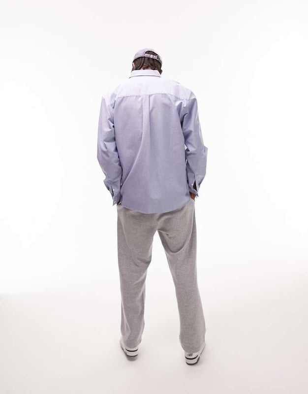 Shirts by Topman Welcome to the next phase of Topman Button-down collar Button placket Chest pocket Long sleeves Relaxed fitSold By: Asos
