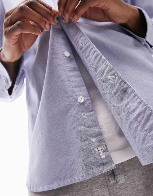 Shirts by Topman Welcome to the next phase of Topman Button-down collar Button placket Chest pocket Long sleeves Relaxed fitSold By: Asos