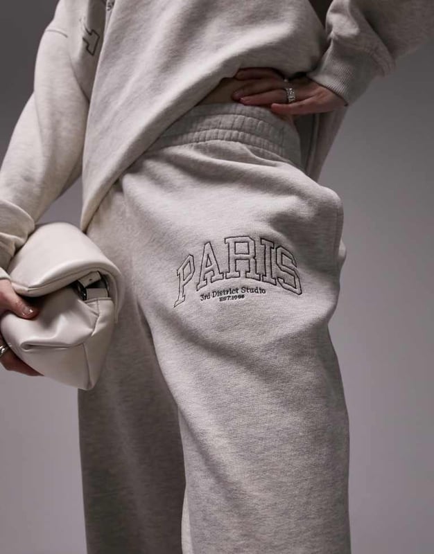 Trousers & Leggings by Topshop Welcome to the next phase of Topshop Sweatshirt sold separately Elasticated waistband Side pockets Text embroidery Straight fitSold By: Asos