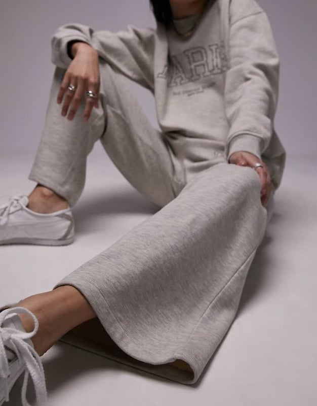 Trousers & Leggings by Topshop Welcome to the next phase of Topshop Sweatshirt sold separately Elasticated waistband Side pockets Text embroidery Straight fitSold By: Asos