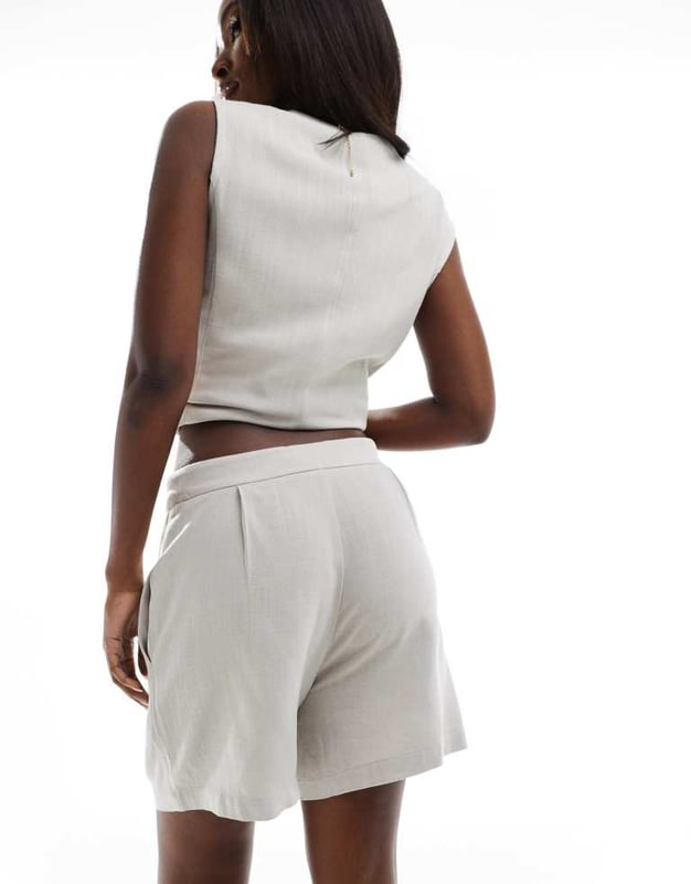 Shorts by In The Style Part of a co-ord set Top sold separately High rise Concealed fly Side pockets Regular fitSold By: Asos