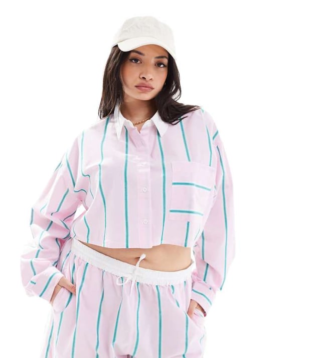 Curve & Plus Size by ASOS DESIGN Brb, adding to basket Stripe design Spread collar Button placket Chest pocket Drop shoulders Boxy fitSold By: Asos