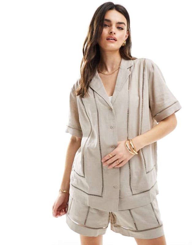 Tops by ASOS DESIGN Summer, styled Revere collar Button placket Short sleeves Ladder trims Relaxed fitSold By: Asos