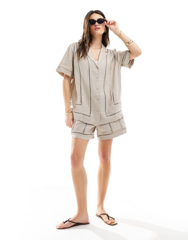 Tops by ASOS DESIGN Summer, styled Revere collar Button placket Short sleeves Ladder trims Relaxed fitSold By: Asos