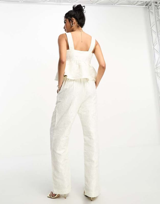 Trousers & Leggings by Y.A.S Part of a co-ord set Top sold separately High rise Stretch-back waistband Side pockets Straight fitSold By: Asos