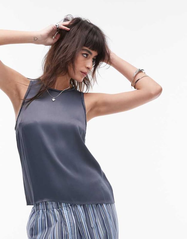 Tops by Topshop This is Topshop Crew neck Button-keyhole back Regular fitSold By: Asos