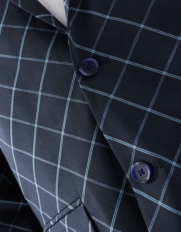 ASOS DESIGN relaxed bias cut check suit jacket in navy windowpane Suits by ASOS DESIGN Suits you Notch lapels Single-breasted style Two-button fastening Pocket details Relaxed fitSold By: Asos