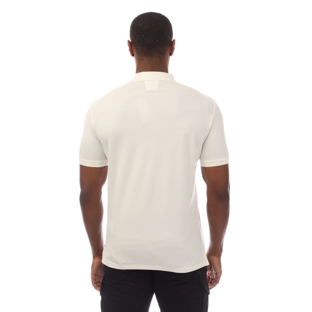 Mens C.P. Company Stretch Piquet Logo Polo Shirt in white.- Polo collar.- Short sleeves with ribbed cuffs.- Two button fastened placket.- Logo patch at the chest.- Split hem to the sides.- Straight hem.- 95% Cotton  5% Elastane.- Ref: 18CMPL065A103