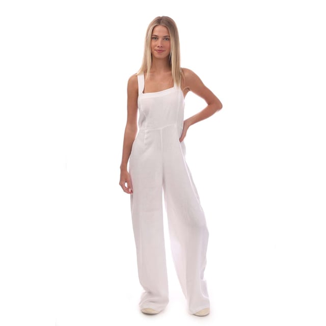 Women's Nobodys Child Maisi Linen Beach Jumpsuit. This cream jumpsuit is the dream. With a shirred back, guaranteeing a great fit. Two thick straps crossover at the back before falling to an effortless wide leg cut. Swing a straw bag over your arm and go.- Thick straps.- Pockets.- Shirred back for comfort.- Concealed zip fastening.- Wide leg cut that skims the body. Material: 55% Linen, 45% Ecovero™ Viscose. Ref: P240486CRM.