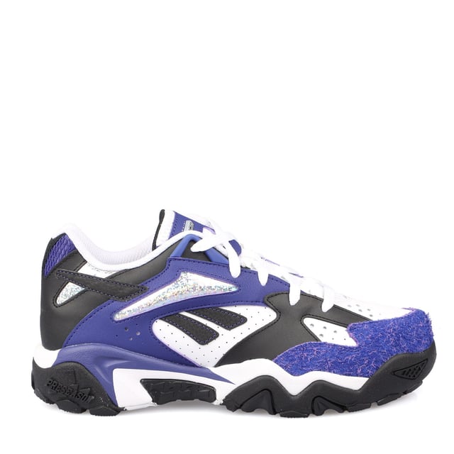Reebok Preseason 94 Low Trainers in purple.- Leather and textile upper.- Lace closure.- TPU-reinforced eyelets.- Textile lining.- Lugged rubber outsole.- Ref.: 100202416