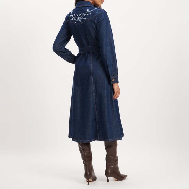Women's Nobodys Child Pase Floral Embroidered Midi Dress. The dress that does it all. This embroidered denim shirt dress will add a touch of western charm to your wardrobe. We love its button front, long sleeves and flattering belt. Turn around to show off the back embroidery. We’re wearing ours with boots.- Collar Long sleeves.- Belted.- Fit and flare cut.- Bronze-tone NC buttons.- Size tip: we recommend your usual size. Material: 100% Organic Cotton. Ref: D242593BLU.