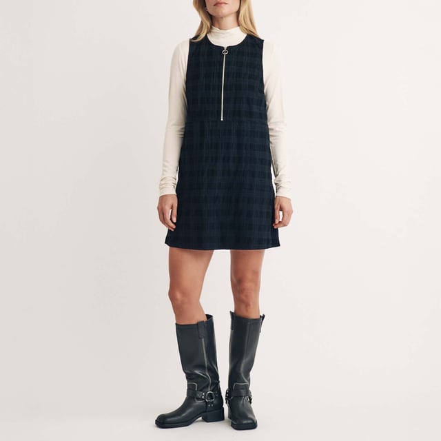 Women's Nobodys Child Homerton Mini Dress. A dream day dress. This black check pinny is perfect for every season. The shift shape is so easy to wear - plus there’s statement pockets.- Style yours with everything you already own.- Round neck.- Half zip fastening.- Pockets. Material: 100% Organic Cotton. Ref: D241876BLK.