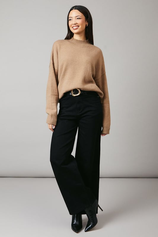 Cosy high neck design for extra warmth
        Relaxed fit with dropped shoulders for effortless style
        Ribbed cuffs and hem for a snug finish
        Versatile knitted texture suitable for various occasions
        Cropped length perfect for high-waisted bottoms
    
    This Principles high neck jumper is a must-have addition to your autumn-winter wardrobe. The relaxed silhouette and dropped shoulders create a laid-back yet chic look, ideal for casual outings or cosy nights in. Style it with wide-leg trousers and ankle boots for a trendy daytime ensemble, or pair it with your favourite jeans and trainers for a quick coffee run. The cropped length makes it a perfect match for high-waisted bottoms, allowing you to experiment with proportions. For a touch of glamour, accessorise with statement earrings and a sleek clutch. This versatile jumper is your go-to piece for family gatherings, weekend brunches, or casual meetups with friends, offering both comfort and style in one effortless package.