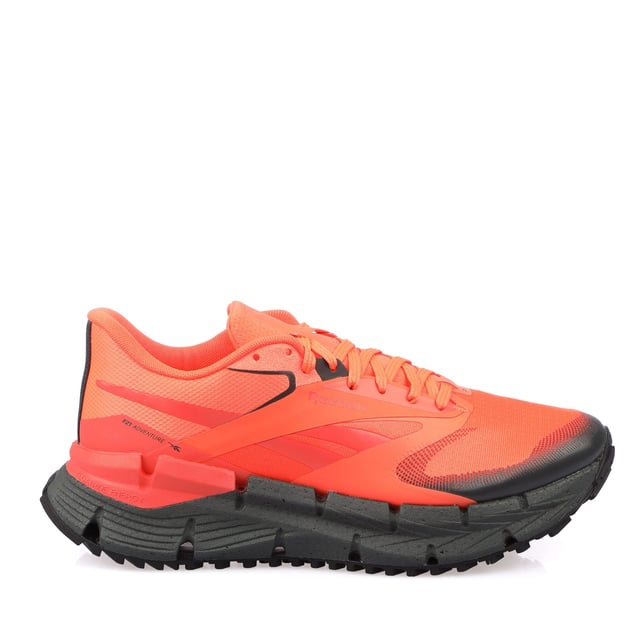 Reebok FloatZig Adventure 1 Trainers in orange black.- Textile upper.- Lace closure.- Floatride Energy Foam.- Textile lining.- High traction rubber outsole.- Ref.: 100212127
