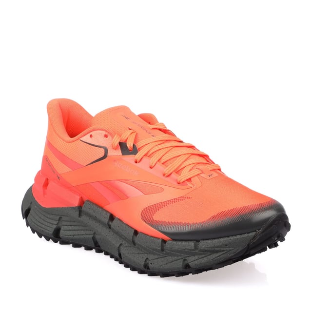 Reebok FloatZig Adventure 1 Trainers in orange black.- Textile upper.- Lace closure.- Floatride Energy Foam.- Textile lining.- High traction rubber outsole.- Ref.: 100212127