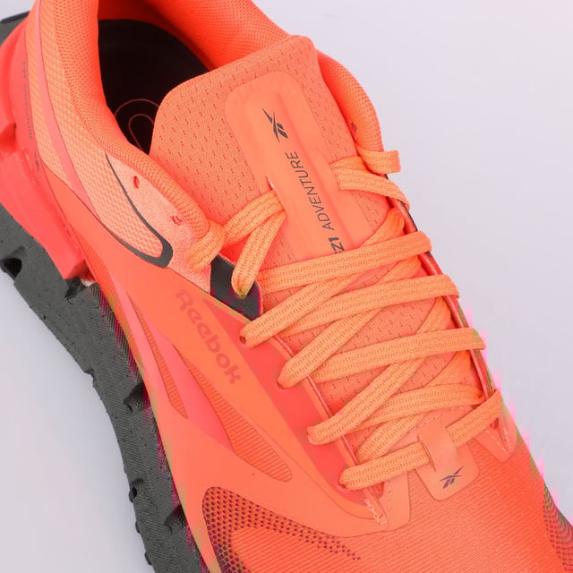 Reebok FloatZig Adventure 1 Trainers in orange black.- Textile upper.- Lace closure.- Floatride Energy Foam.- Textile lining.- High traction rubber outsole.- Ref.: 100212127