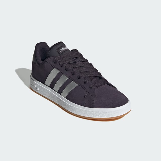 Stylish yet practical, these adidas sneakers are your go-to. Whether wandering city streets or lounging in the park, the rich suede upper, emblazoned with the 3-Stripes, makes an instant impression. A classic rubber cupsole completes the look, adding sporty flair while providing traction on any terrain. Wear yours with everything from jeans to dresses. This product features at least 20% recycled materials. By reusing materials that have already been created, adidas help to reduce waste and our reliance on finite resources and reduce the footprint of the products adidas make.  - Regular fit - Lace closure - Suede upper - Textile lining - Rubber cupsole - Contains at least 20% recycled content  Shipped by adidas