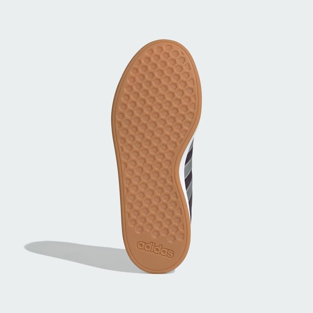 Stylish yet practical, these adidas sneakers are your go-to. Whether wandering city streets or lounging in the park, the rich suede upper, emblazoned with the 3-Stripes, makes an instant impression. A classic rubber cupsole completes the look, adding sporty flair while providing traction on any terrain. Wear yours with everything from jeans to dresses. This product features at least 20% recycled materials. By reusing materials that have already been created, adidas help to reduce waste and our reliance on finite resources and reduce the footprint of the products adidas make.  - Regular fit - Lace closure - Suede upper - Textile lining - Rubber cupsole - Contains at least 20% recycled content  Shipped by adidas