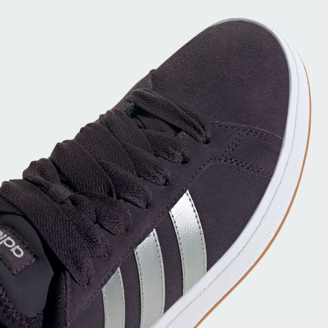 Stylish yet practical, these adidas sneakers are your go-to. Whether wandering city streets or lounging in the park, the rich suede upper, emblazoned with the 3-Stripes, makes an instant impression. A classic rubber cupsole completes the look, adding sporty flair while providing traction on any terrain. Wear yours with everything from jeans to dresses. This product features at least 20% recycled materials. By reusing materials that have already been created, adidas help to reduce waste and our reliance on finite resources and reduce the footprint of the products adidas make.  - Regular fit - Lace closure - Suede upper - Textile lining - Rubber cupsole - Contains at least 20% recycled content  Shipped by adidas