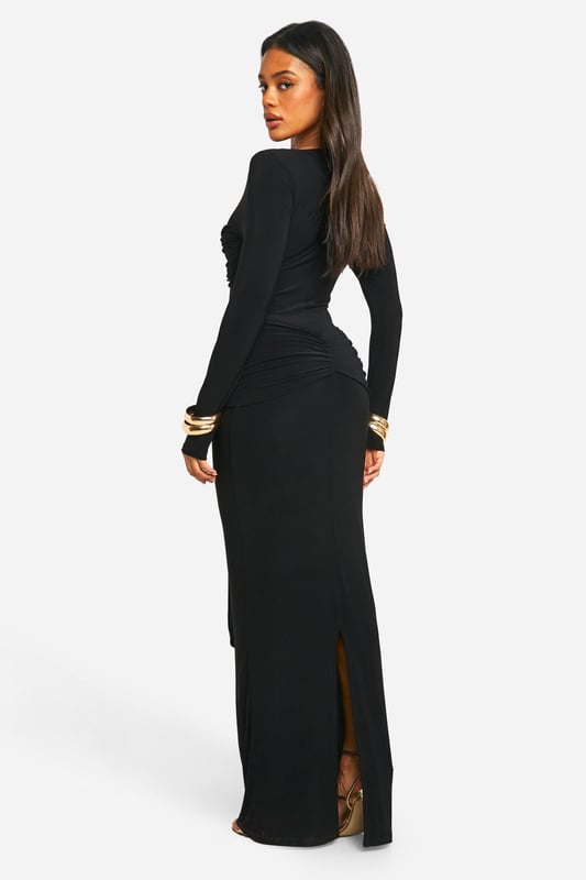 Striking twist-detail at the waist for a flattering silhouette
        Floor-sweeping maxi length for dramatic elegance
        Long sleeves and slash neckline offer versatile styling options
        Figure-hugging ITY jersey fabric with gentle stretch
        Gathered design creates a luxurious drape effect
    
    Make a lasting impression with this show-stopping maxi dress from Boohoo. The eye-catching twist detail at the waist creates a stunning focal point, accentuating your curves and adding a touch of sophistication. Perfect for those nights out when you want to turn heads, this dress effortlessly combines comfort with high fashion. Style it with strappy heels and statement earrings for a glamorous club look, or dress it down with metallic flats and a clutch for drinks with the girls. The versatile slash neckline allows for various jewellery options, while the long sleeves provide coverage without compromising on style. Whether you're dancing the night away or enjoying cocktails at a rooftop bar, this dress will ensure you're the centre of attention in all the right ways.