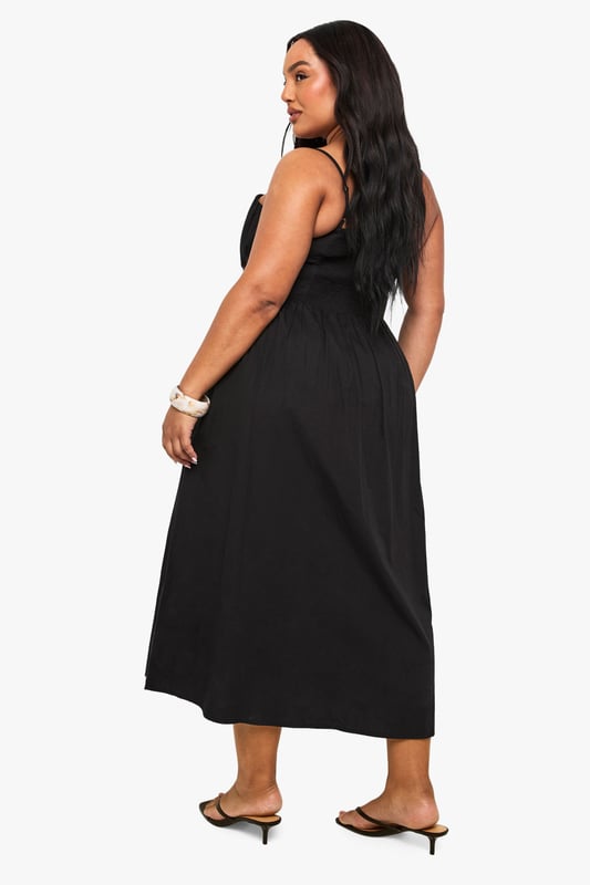 Crafted from breathable cotton poplin fabric for all-day comfort
        Elegant square neckline with adjustable spaghetti straps
        Empire waistline creates a flattering silhouette
        Flowing maxi length with relaxed skirt for effortless movement
        Versatile design perfect for warm-weather styling
    
    This breezy cotton maxi dress combines comfort with casual sophistication. The square neckline and empire waist create a feminine shape that flatters your curves, while the flowing skirt offers graceful movement with every step. Style with flat sandals and a woven clutch for daytime gatherings, or dress it up with layered bangles and statement earrings for evening drinks. The adjustable straps ensure a customised fit, making this an essential addition to your warm-weather wardrobe. Perfect for family barbecues, beach holidays, or weekend brunches, this Boohoo dress delivers effortless style for the fashion-forward woman who values both comfort and trend-conscious design. Pair with a denim jacket for cooler evenings or wear alone to showcase its simple elegance.