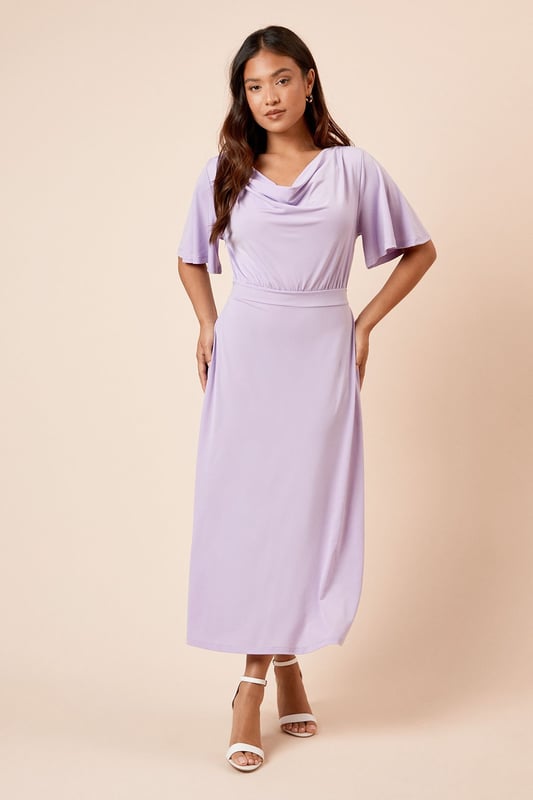 Elegant cowl neckline creates a soft, draped effect at the front
        Flutter sleeves add a feminine touch and gentle movement
        Flattering midi length falls elegantly below the knee
        Tie-back detail creates a customised fit and adds visual interest
        Defined waistline creates a figure-enhancing silhouette
    
    This Dorothy Perkins midi dress combines comfort with sophistication through its graceful cowl neckline and flowing silhouette. The delicate flutter sleeves provide just the right amount of coverage whilst maintaining a light, airy feel. The tie-back detail allows for a personalised fit that accentuates your waistline beautifully. Style with simple strappy sandals and minimal jewellery for casual brunches with the girls, or dress it up with block-heeled ankle boots and a structured crossbody bag for family gatherings. The versatile design makes it perfect for baby showers or afternoon tea, where you can pair it with a lightweight cardigan and ballet flats for a polished yet comfortable ensemble. This dress transitions effortlessly from daytime casual to evening drinks with a simple change of accessories.