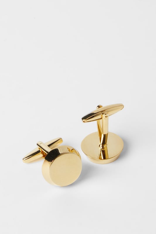 Classic round design for timeless sophistication
        Smooth metal finish that catches the light beautifully
        Secure fastening mechanism for reliable wear
        Versatile size suitable for all formal shirt styles
        Presented on Burton branded card for gifting
    
    These round cufflinks offer the perfect finishing touch to any formal ensemble. The clean, minimalist design works effortlessly with both traditional and contemporary shirting, making them an essential addition to your accessories collection. Ideal for weddings, important business meetings or smart evening events, they add a subtle touch of refinement without overwhelming your look. Pair with a crisp white shirt and tailored Burton suit for classic boardroom style, or team with a textured shirt for more relaxed smart-casual occasions. These cufflinks transition seamlessly from daytime formality to evening sophistication, ensuring you're always appropriately dressed for any occasion that calls for a touch of polish. A practical investment piece that will serve your wardrobe for years to come.