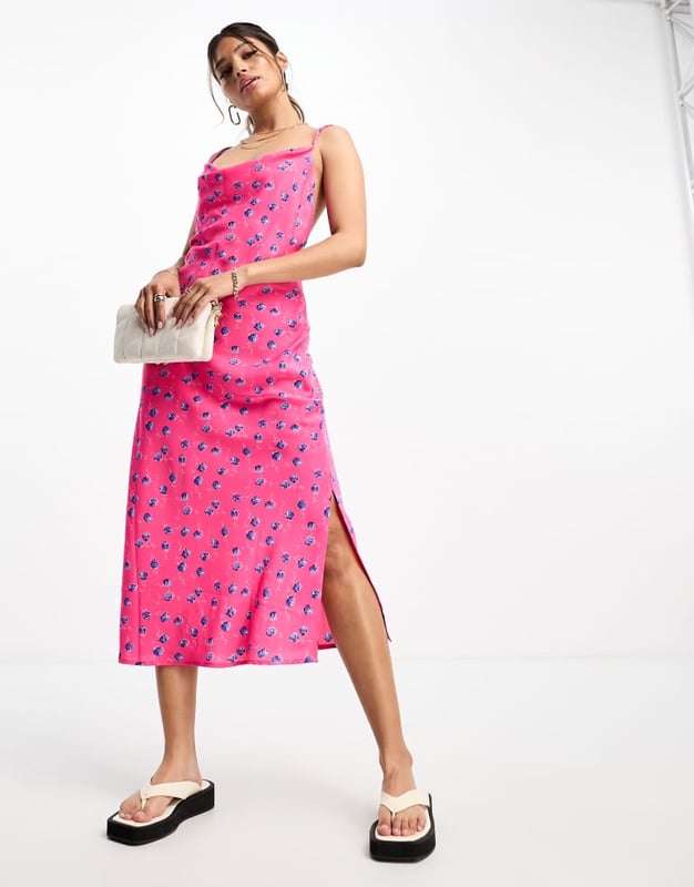 Dresses by Vila There's dressing up, then there's this Cowl neck Cross-back straps Side split Regular fitSold By: Asos