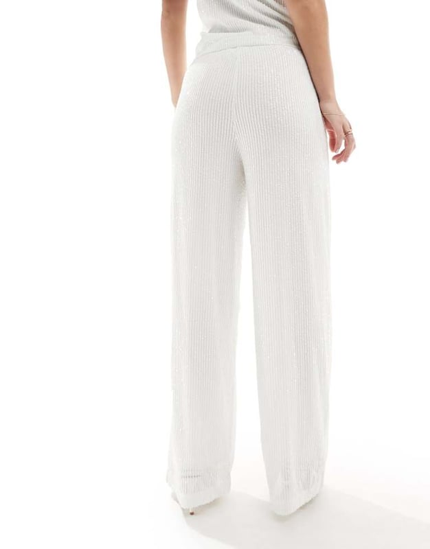 Trousers & Leggings by Vila Part of a co-ord set Top and blazer sold separately Sequin embellishment High rise Elasticated waist Wide legSold By: Asos