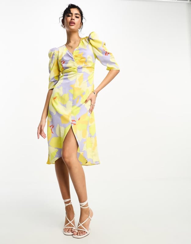 Dresses by Vila Best dressed: secured V-neck Ruched front Puff sleeves Regular fitSold By: Asos