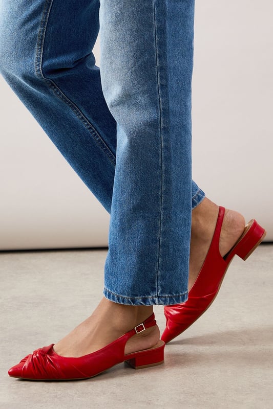 Elegant pointed toe design with sophisticated twist detail at the front
        Comfortable low heel measuring between 2.5-4.5cm for all-day wearability
        Adjustable slingback strap with buckle fastening for a secure fit
        Faux leather finish offering a polished, sophisticated appearance
        Versatile silhouette that pairs beautifully with both trousers and dresses
    
    These sophisticated slingbacks strike the perfect balance between style and comfort. The elegant pointed toe and distinctive twist detail create a refined silhouette, whilst the practical low heel ensures you can wear them from morning to evening without discomfort. Style them with rolled-up jeans for a casual daytime look that still conveys sophistication, or pair with tailored trousers and a crisp white shirt for family gatherings or lunch dates. The adjustable slingback design offers both security and a touch of feminine charm, making these shoes a versatile addition to your wardrobe. Their timeless appeal works wonderfully for various daywear occasions, from shopping trips to casual office environments. The sleek design ensures they'll complement virtually any outfit, making them a reliable go-to when you want to look effortlessly put-together without sacrificing comfort.