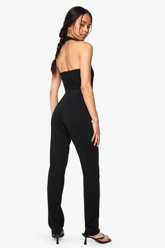 Sleek slim-fit design crafted from ponte fabric for exceptional shape retention
        Streamlined silhouette with clean front seam detailing for a polished look
        Comfortable stretch blend that moves with your body throughout the day
        Versatile mid-rise waistband offering flattering support
        Classic straight-leg cut that pairs effortlessly with both casual and smart attire
    
    These Boohoo slim-fit trousers are the wardrobe essential you've been searching for. The ponte fabric creates a smooth, structured silhouette while maintaining remarkable comfort for all-day wear. Style them as shown with a simple black top and strappy heels for evening drinks, or dress them down with trainers and an oversized blazer for daytime chic. The versatile design transitions seamlessly from office to weekend brunch, making them ideal for the fashion-forward woman who values both style and practicality. For casual gatherings, pair with a relaxed tee and denim jacket, or elevate your look with a silky blouse and statement jewellery for family celebrations. These trousers offer the perfect balance of comfort and sophistication, ensuring they'll quickly become your go-to piece for countless occasions.
