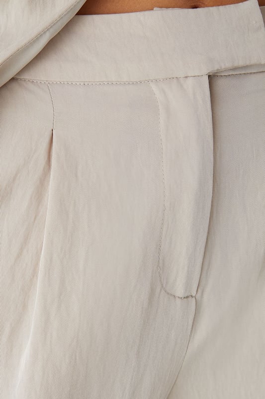 Tailored wide leg design for a dramatic silhouette that commands attention
        Practical side pockets perfect for stashing your essentials on a night out
        High-rise waistband to flatter your figure and provide comfortable all-day wear
        Smooth twill fabric that drapes beautifully with movement
        Versatile design that transitions effortlessly from day to evening events
    
    Make a statement in these MissPap Twill Wide Leg Tailored Trousers, designed to turn heads wherever you go. The dramatic wide leg cut creates a bold silhouette that flows gracefully with every step, whilst the high-rise waistband accentuates your waist for a figure-flattering effect. Style with a cross-halter top as shown for a night on the town, or dress down with a fitted tee and trainers for daytime chic. These trousers work brilliantly for family gatherings when paired with a soft blouse and flat sandals, or amp up the drama for evening drinks with strappy heels and statement jewellery. The side pockets add practical functionality to this fashion-forward piece, making these trousers the perfect addition to your wardrobe for those who want to showcase their confident style whilst maintaining comfort.