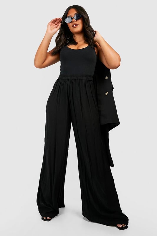 From top to bottom, we've got you covered with this season's perfect pair of plus size trousers. Figure flattering, practical, and an essential addition to your new-season wardrobe, this style is made with extra fabric to ensure the perfect fit. Team a pair of plus size wide leg trousers with a lace bodysuit and barely-there heels for style too good to go unnoticed. It doesn't matter if you're after simple or statement, our dedicated range of plus size pants has the key garms you need.Style: Wide Leg TrousersFabric: Cheesecloth
