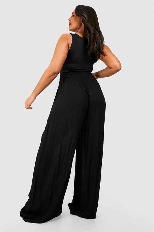 From top to bottom, we've got you covered with this season's perfect pair of plus size trousers. Figure flattering, practical, and an essential addition to your new-season wardrobe, this style is made with extra fabric to ensure the perfect fit. Team a pair of plus size wide leg trousers with a lace bodysuit and barely-there heels for style too good to go unnoticed. It doesn't matter if you're after simple or statement, our dedicated range of plus size pants has the key garms you need.Style: Wide Leg TrousersFabric: Cheesecloth