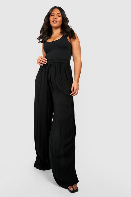 From top to bottom, we've got you covered with this season's perfect pair of plus size trousers. Figure flattering, practical, and an essential addition to your new-season wardrobe, this style is made with extra fabric to ensure the perfect fit. Team a pair of plus size wide leg trousers with a lace bodysuit and barely-there heels for style too good to go unnoticed. It doesn't matter if you're after simple or statement, our dedicated range of plus size pants has the key garms you need.Style: Wide Leg TrousersFabric: Cheesecloth