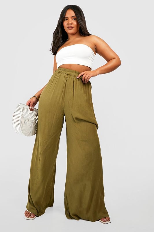 From top to bottom, we've got you covered with this season's perfect pair of plus size trousers. Figure flattering, practical, and an essential addition to your new-season wardrobe, this style is made with extra fabric to ensure the perfect fit. Team a pair of plus size wide leg trousers with a lace bodysuit and barely-there heels for style too good to go unnoticed. It doesn't matter if you're after simple or statement, our dedicated range of plus size pants has the key garms you need.Style: Wide Leg TrousersFabric: Cheesecloth