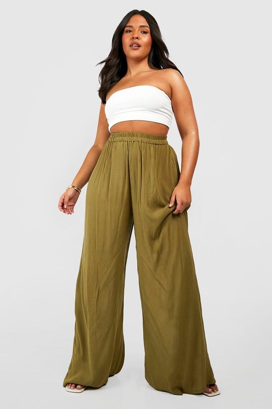 From top to bottom, we've got you covered with this season's perfect pair of plus size trousers. Figure flattering, practical, and an essential addition to your new-season wardrobe, this style is made with extra fabric to ensure the perfect fit. Team a pair of plus size wide leg trousers with a lace bodysuit and barely-there heels for style too good to go unnoticed. It doesn't matter if you're after simple or statement, our dedicated range of plus size pants has the key garms you need.Style: Wide Leg TrousersFabric: Cheesecloth