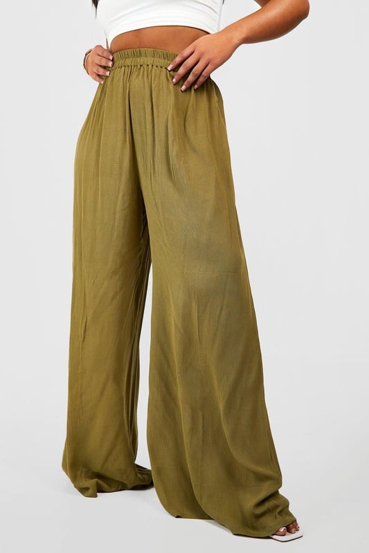 From top to bottom, we've got you covered with this season's perfect pair of plus size trousers. Figure flattering, practical, and an essential addition to your new-season wardrobe, this style is made with extra fabric to ensure the perfect fit. Team a pair of plus size wide leg trousers with a lace bodysuit and barely-there heels for style too good to go unnoticed. It doesn't matter if you're after simple or statement, our dedicated range of plus size pants has the key garms you need.Style: Wide Leg TrousersFabric: Cheesecloth