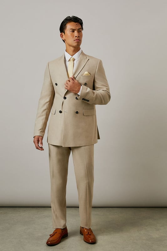 Slim fit design with a tailored silhouette that defines the leg without restricting movement
        Textured woven fabric adds subtle dimension and visual interest to your formal attire
        Classic flat front styling for a clean, contemporary appearance
        Functional side pockets and button-fastened back pockets for practicality
        Versatile neutral tone that pairs effortlessly with various shirt and jacket combinations
    
    These textured slim fit trousers from Burton deliver refined style with modern sensibility. The tailored cut creates a sharp silhouette that's ideal for the gentleman who appreciates classic styling with contemporary proportions. Perfect for work-to-weekend versatility, pair them with the matching jacket for formal occasions or team with a crisp white shirt as shown for smart-casual events. The textured fabric adds character whilst maintaining a sophisticated appearance that works brilliantly for important meetings or social gatherings. These trousers coordinate seamlessly with brown leather brogues and a complementary belt for a polished finish. An essential addition to any discerning wardrobe, these trousers will become your go-to choice for everything from business meetings to sophisticated evening events at your local gastropub.
