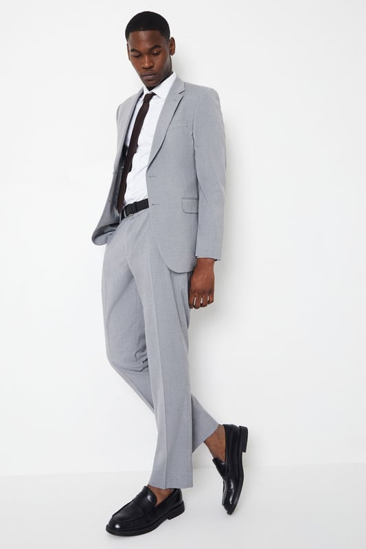 Introducing our Essential Tailored Fit Smart trousers, a must-have addition to your wardrobe. These trousers features a zip fly fastening for convenience and is designed to provide a sleek and polished look. Made with a polyester viscose blend with added stretch ensures a cool and comfortable fit all day long. Pair these versatile trousers with matching items, perfect for any smart occasion.