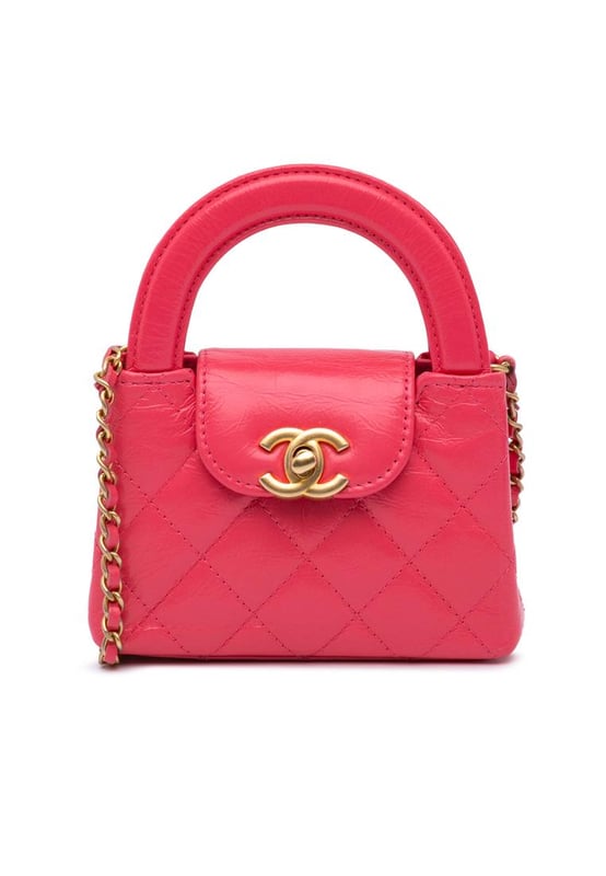 This satchel features an aged calfskin leather body flat leather handles a leather woven chain link shoulder strap a top flap with turn lock closure and an interior slip pocket.Brand: ChanelCondition: Pre-lovedType: SatchelRating: ABMain Material: LeatherDimensions (LxWxD): 8x11.5x3Strap Drop: 58Handle Drop: 5Comments: Lock Scratched. Exterior Front Scratched. Exterior Handle Scratched. Exterior Side Creased. Exterior Top Creased.