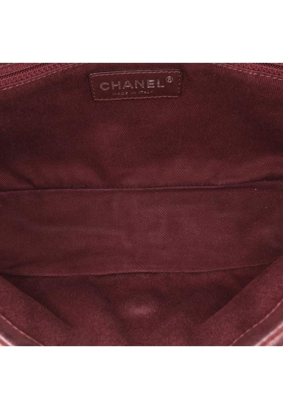 This satchel features a quilted lambskin leather body a flat leather top handle a leather woven chain link strap a front flap with CC turn lock closure and an interior zip pocket.Brand: ChanelCondition: Pre-lovedType: SatchelRating: B+Main Material: LeatherDimensions (LxWxD): 15x26.5x8Strap Drop: 28.5Comments: Lock Scratched. Exterior Handle Worn. Interior Lining stained with Other. Practical Attachment Scratched. Exterior Side Cracked Worn. Item has an odor of Other.