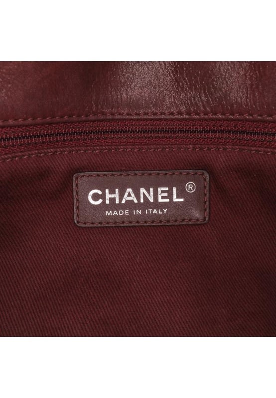 This satchel features a quilted lambskin leather body a flat leather top handle a leather woven chain link strap a front flap with CC turn lock closure and an interior zip pocket.Brand: ChanelCondition: Pre-lovedType: SatchelRating: B+Main Material: LeatherDimensions (LxWxD): 15x26.5x8Strap Drop: 28.5Comments: Lock Scratched. Exterior Handle Worn. Interior Lining stained with Other. Practical Attachment Scratched. Exterior Side Cracked Worn. Item has an odor of Other.