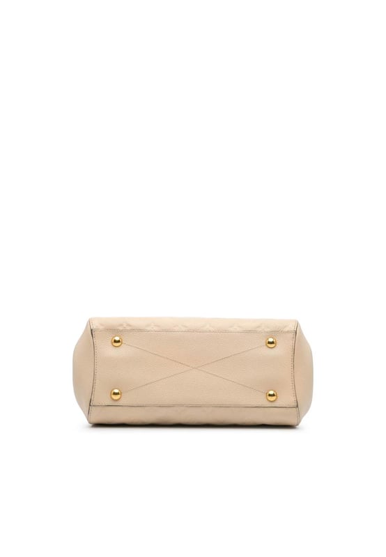 The Montaigne MM features a monogram empreinte leather body rolled leather handles a detachable flat leather strap an open top with lobster claw closure and interior zip and slip pockets.Brand: Louis VuittonCondition: Pre-lovedType: SatchelRating: B+Main Material: LeatherDimensions (LxWxD): 23x34x12Strap Drop: 37Handle Drop: 12.5Comments: Exterior Back Scratched Worn. Exterior Corners Worn. Embellishment Scratched. Exterior Front Worn. Exterior Handle Worn. Interior Lining Worn. Zipper Scratched.