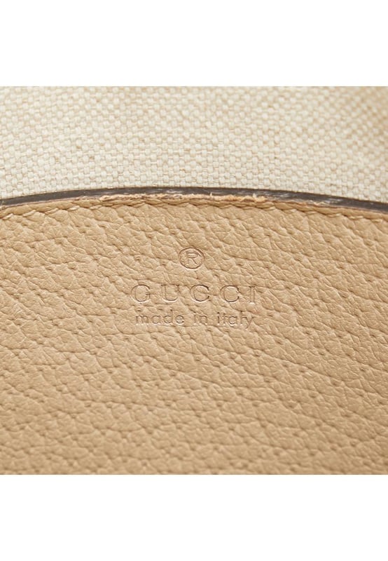 The Horsebit 1955 satchel features a coated canvas body with leather trim rolled leather handles a zip-around closure and interior zip and slip pockets.Brand: GucciCondition: Pre-lovedType: SatchelRating: B+Main Material: FabricDimensions (LxWxD): 17.5x20x7Handle Drop: 8.5Comments: Exterior Back Out Of Shape. Exterior Bottom Out Of Shape. Exterior Corners Worn. Exterior Front Discolored Out Of Shape. Exterior Front stained with Other. Exterior Handle Discolored Out Of Shape Scratched Worn. Interior Pocket stained with Pen Mark Other. Interior Lining Worn. Interior Lining stained with Other. Practical Attachment Scratched. Exterior Side Out Of Shape. Exterior Top Out Of Shape Scratched. Zipper Scratched.