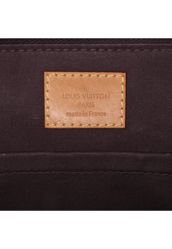 The Alma BB features a monogram vernis leather body a clochette rolled leather handles a top zip-around closure and an interior slip pocket.Brand: Louis VuittonCondition: Pre-lovedType: SatchelRating: B+Main Material: LeatherDimensions (LxWxD): 17.5x23.5x11.5Strap Drop: 56.5Handle Drop: 10.5Comments: Exterior Bottom Scratched. Exterior Handle Scratched. Interior Lining stained with Other. Practical Attachment Scratched. Exterior Top stained with Other. Zipper Scratched.