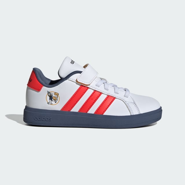 Wherever kids go, their Disney favourites go with them. These kids' adidas sneakers bring a little magic to play dates, park trips and more. The lightweight upper is lined for comfort while the flexible rubber outsole stands up to daily wear. Stretchy laces make for easy on and off, so nothing gets in the way of the fun.  - Regular fit - Elastic laces with hook-and-loop top strap - Synthetic upper - Textile lining - Disney's Mickey and Friends graphics - Rubber outsole - ©Disney  Shipped by adidas