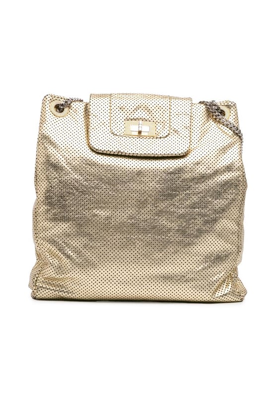 This tote bag features a perforated leather body chain link straps a top flap with a twist lock closure and interior zip and slip pockets.Brand: ChanelCondition: Pre-lovedType: Tote BagRating: B+Main Material: LeatherDimensions (LxWxD): 36x32.5x7Strap Drop: 33Comments: Exterior Back Worn. Lock Scratched. Exterior Corners Worn. Exterior Front Creased. Practical Attachment Scratched. Zipper Scratched.